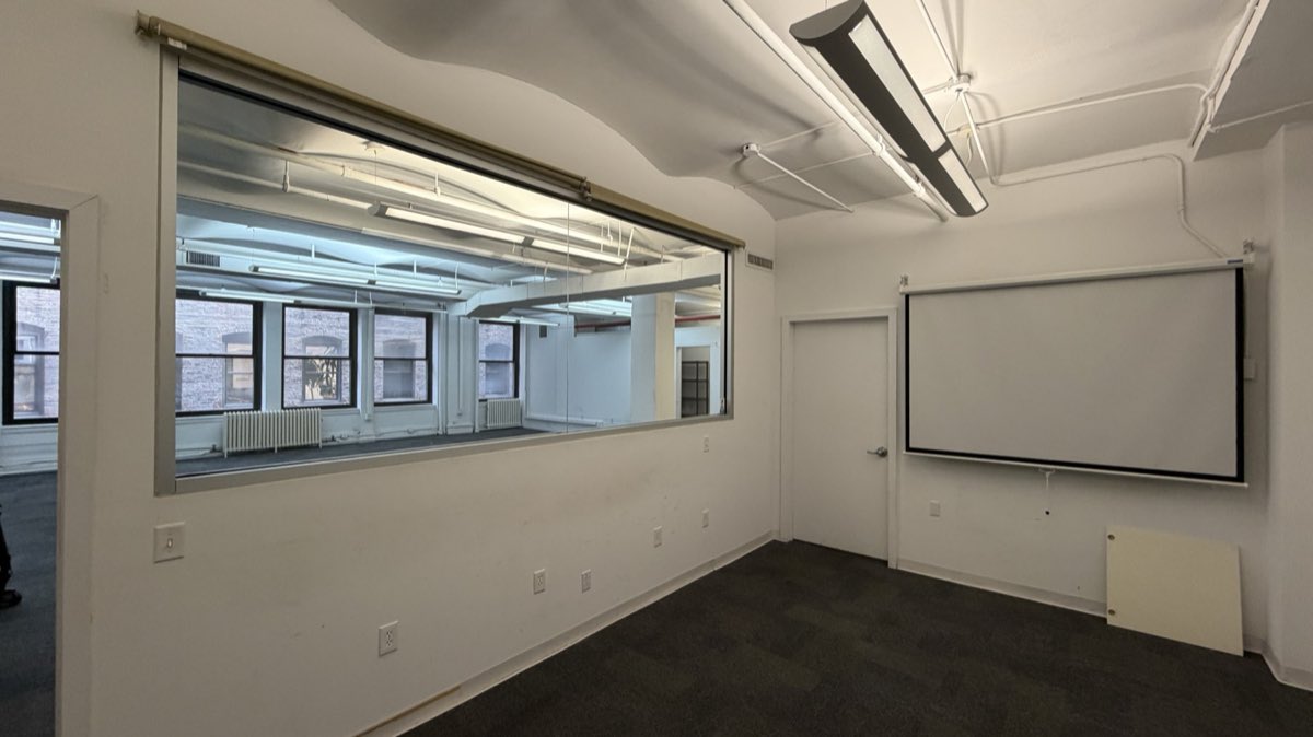 Suite 403 conference room with interior glazing